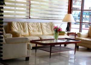 Uma área de estar em Hotel San Martin