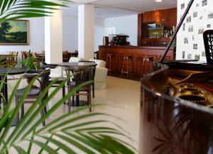 Um restaurante ou outro lugar para comer em Hotel San Martin