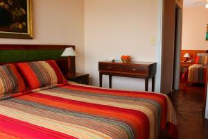 Cama o camas de una habitación en Hotel San Martin