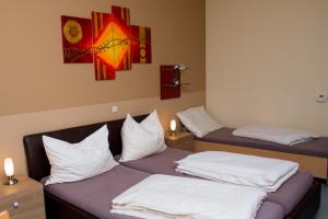 Letto o letti in una camera di Welog Rast Ilz
