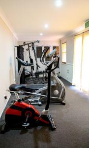 a gym with two exercise bikes in a room at Dirranbandi Motor Inn in Dirranbandi