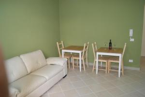 Seating area sa Guest House Golfo Xifonio