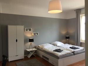 Uma cama ou camas num quarto em Nice n´Nordic 2