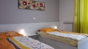 Postel nebo postele na pokoji v ubytování Apartma & RAfting