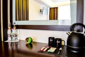 Příslušenství pro přípravu čaje a kávy v ubytování Hotel Smart