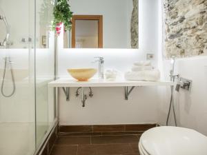 a bathroom with a sink and a shower at Hotel Marina in Monterosso al Mare +37 photos
