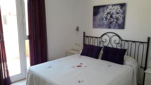 A bed or beds in a room at Duplex Atlan II Még 5 kép