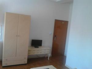 TV a/nebo společenská místnost v ubytování Residence Rotonda