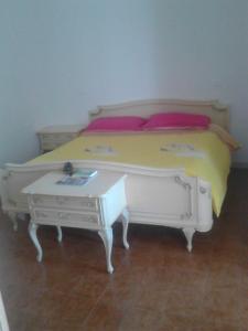 Postel nebo postele na pokoji v ubytování Residence Rotonda