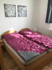 Ein Bett oder Betten in einem Zimmer der Unterkunft Penzion Janovice