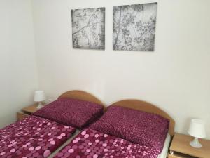 Ein Bett oder Betten in einem Zimmer der Unterkunft Penzion Janovice