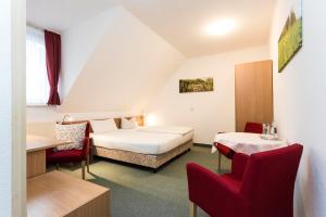Ένα ή περισσότερα κρεβάτια σε δωμάτιο στο Pension & Restaurant Nordstern