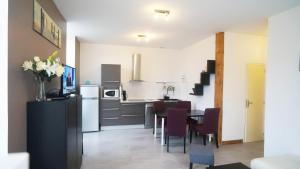 Dapur atau dapur kecil di Le Puligny, appartement classé 3 étoiles