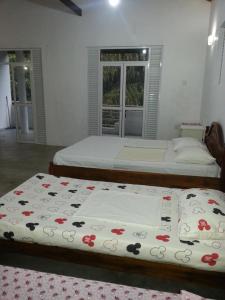 Ein Bett oder Betten in einem Zimmer der Unterkunft Forest View Homestay