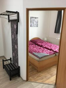 Ein Bett oder Betten in einem Zimmer der Unterkunft Penzion Janovice