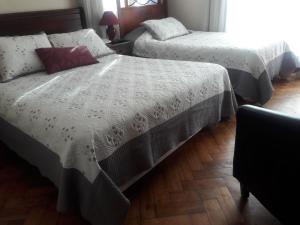 Postel nebo postele na pokoji v ubytování Hotel Vista Hermosa 17