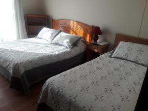 Postel nebo postele na pokoji v ubytování Hotel Vista Hermosa 17