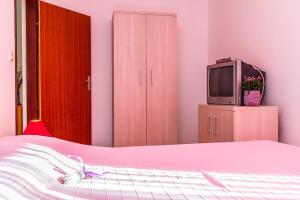 Postel nebo postele na pokoji v ubytování Apartments Valbandon