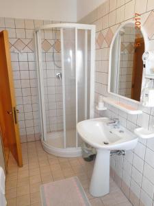 Koupelna v ubytování Albergo Ristorante da Settimio