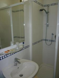 Koupelna v ubytování Hotel Anfora