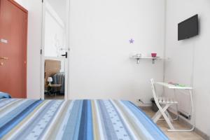 TV a/nebo společenská místnost v ubytování B&B Il Canto Del Mare + 26 fotografií