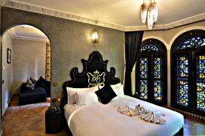Postel nebo postele na pokoji v ubytování Palais Ommeyad Suites & Spa