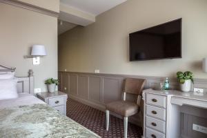TV a/nebo společenská místnost v ubytování Hotel Sinchronas