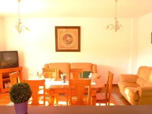 A television and/or entertainment centre at Holiday Home in Canillas near Beach Még 32 kép