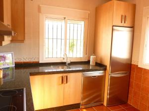 A kitchen or kitchenette at Holiday Home in Canillas near Beach