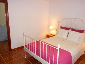 A bed or beds in a room at Holiday Home in Canillas near Beach