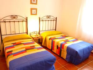 A bed or beds in a room at Holiday Home in Canillas near Beach