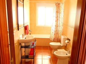 A bathroom at Holiday Home in Canillas near Beach