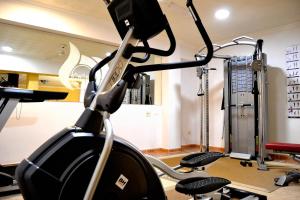 a room with a gym with a treadmill at Hotel Monopol in Puerto de la Cruz