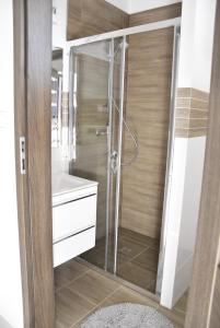 Kúpeľňa v ubytovaní Mazuria Apartamenty