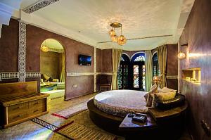 TV a/nebo společenská místnost v ubytování Palais Ommeyad Suites & Spa + 36 fotografií