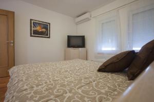 Postel nebo postele na pokoji v ubytování Guesthouse Rota