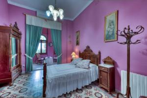 Posteľ alebo postele v izbe v ubytovaní Hotel Casa Ceremines