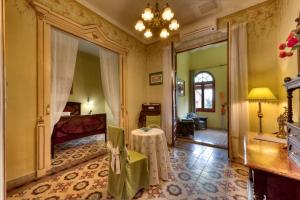 Posteľ alebo postele v izbe v ubytovaní Hotel Casa Ceremines