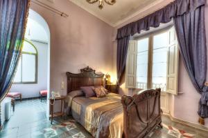 Posteľ alebo postele v izbe v ubytovaní Hotel Casa Ceremines