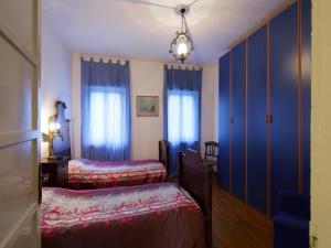 A bed or beds in a room at Agriturismo Le Spezie