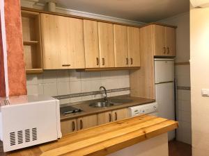 Η κουζίνα ή μικρή κουζίνα στο Apartamentos Arroyo Frío