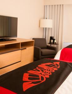 TV o dispositivi per l'intrattenimento presso Kwa'lilas Hotel