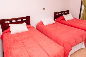 Postel nebo postele na pokoji v ubytování Hotel Altos de Atacama