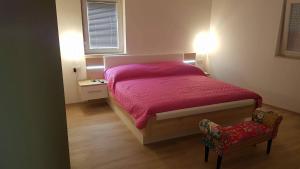 Postel nebo postele na pokoji v ubytování Apartments Roko Kolinda