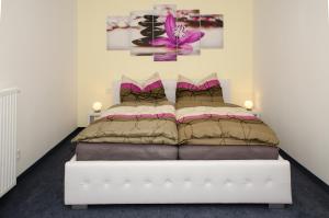 A bed or beds in a room at Haus - Salzkammergut