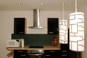 A kitchen or kitchenette at Haus - Salzkammergut