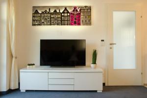 A television and/or entertainment centre at Haus - Salzkammergut