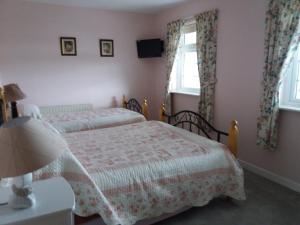 Postel nebo postele na pokoji v ubytování Villa Pio Accommodation Cong