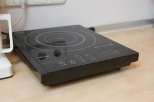 a black router sitting on top of a table at Casa Boer in Satu Mare