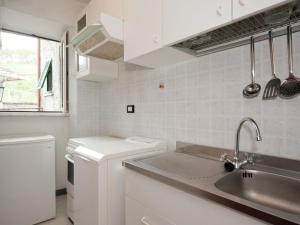 A cozinha ou cozinha compacta de Flat with terrace 15km from Cinque Terre